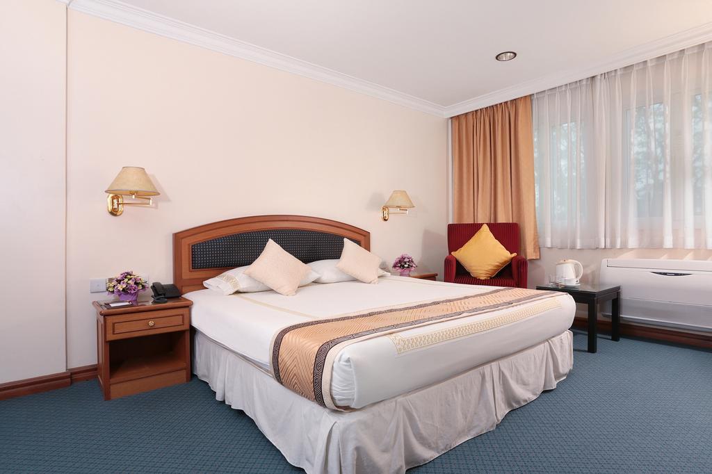 Hotel Sentosa Kuala Belait Szoba fotó