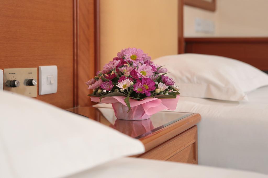 Hotel Sentosa Kuala Belait Szoba fotó