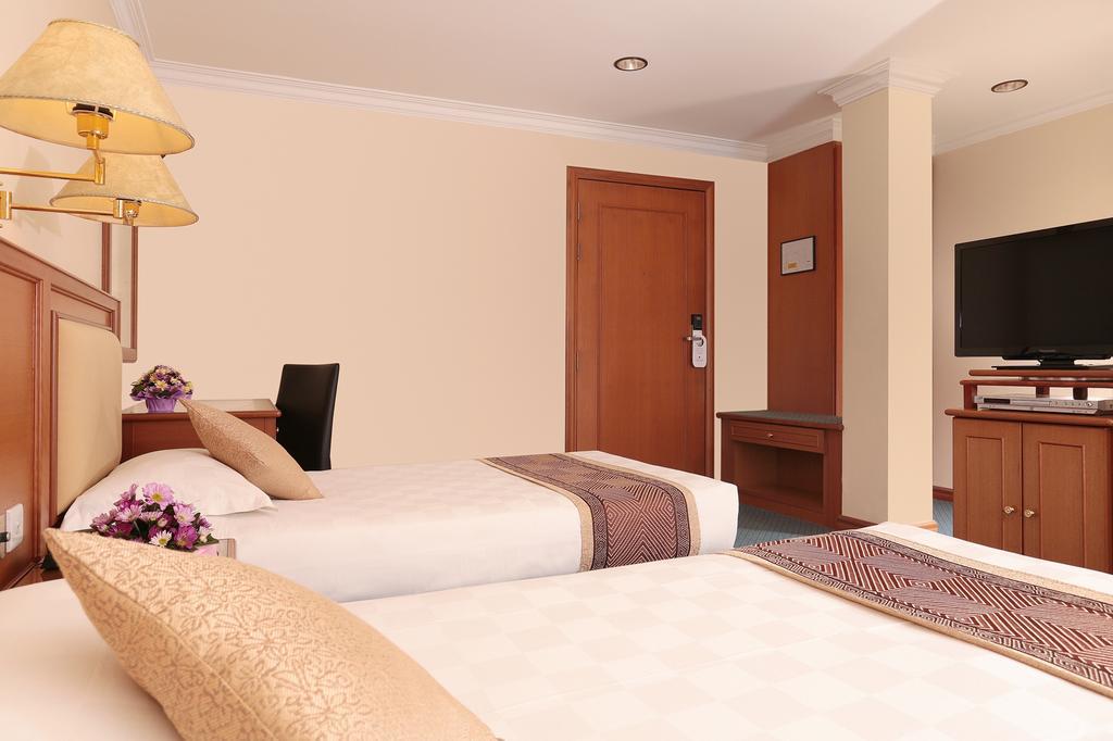 Hotel Sentosa Kuala Belait Szoba fotó
